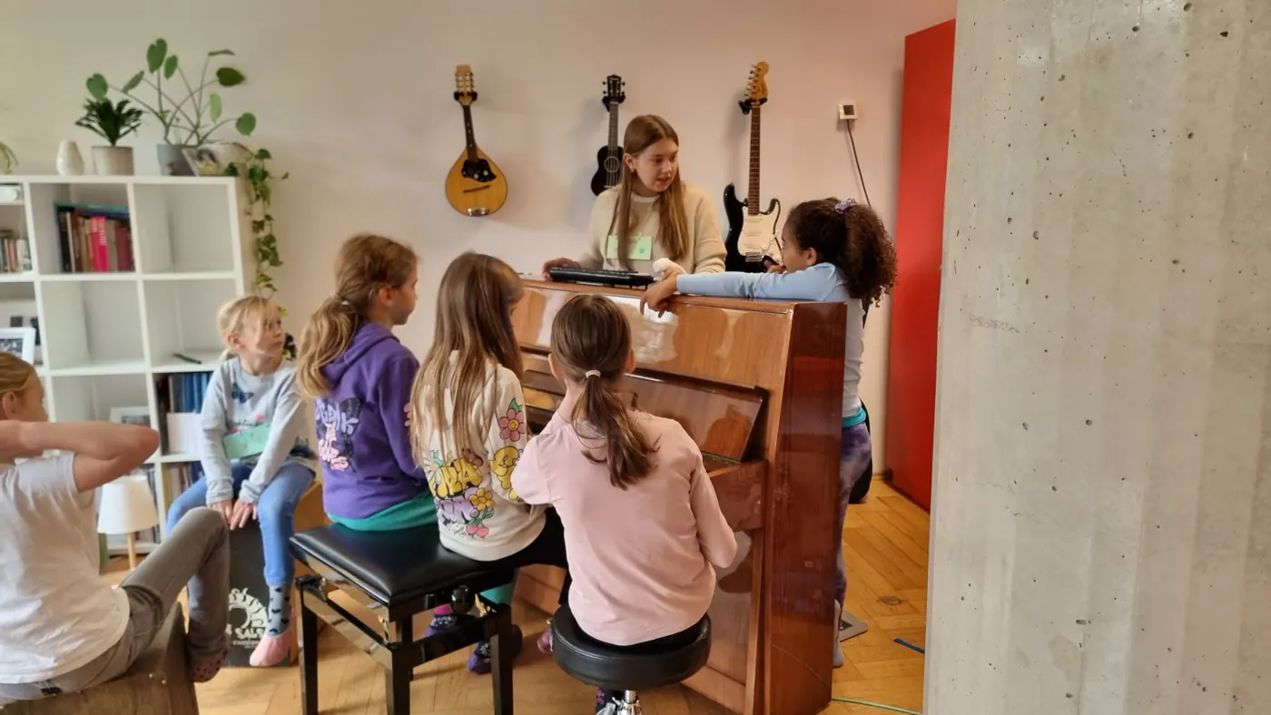 Making music together at a piano