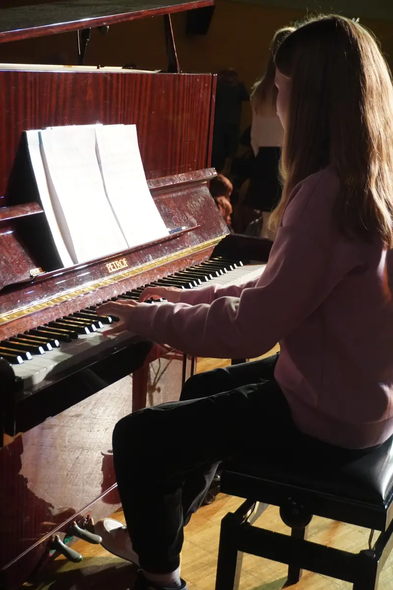 A pianist concentrating on her score